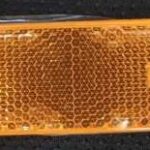 REFLECTOR AMBER SCREW ON 70 x 30